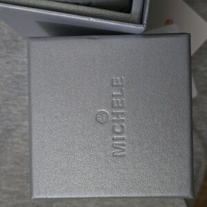 Michele Black and silvertone women's silicone band watch